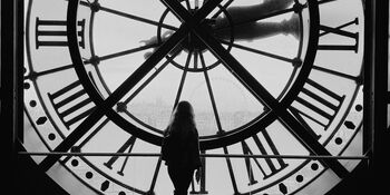 Woman in front of clock at Musee D'Orsay by Hannah Busing on Unsplash