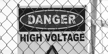 Sign danger high voltage photo by Erik Mclean Pexels
