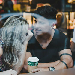 Couple talking in coffee shop photo by eduardo simones by pexels