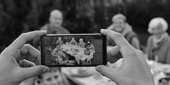 Family eating at a reunion by askar abayev on Unsplash