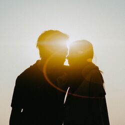 Couple about to kiss by Thanh Tran on Unsplash