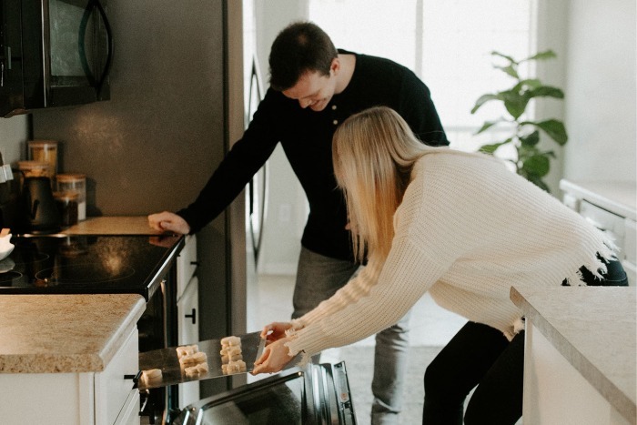 Couple baking together Photo by Hannah Busing on Unsplash